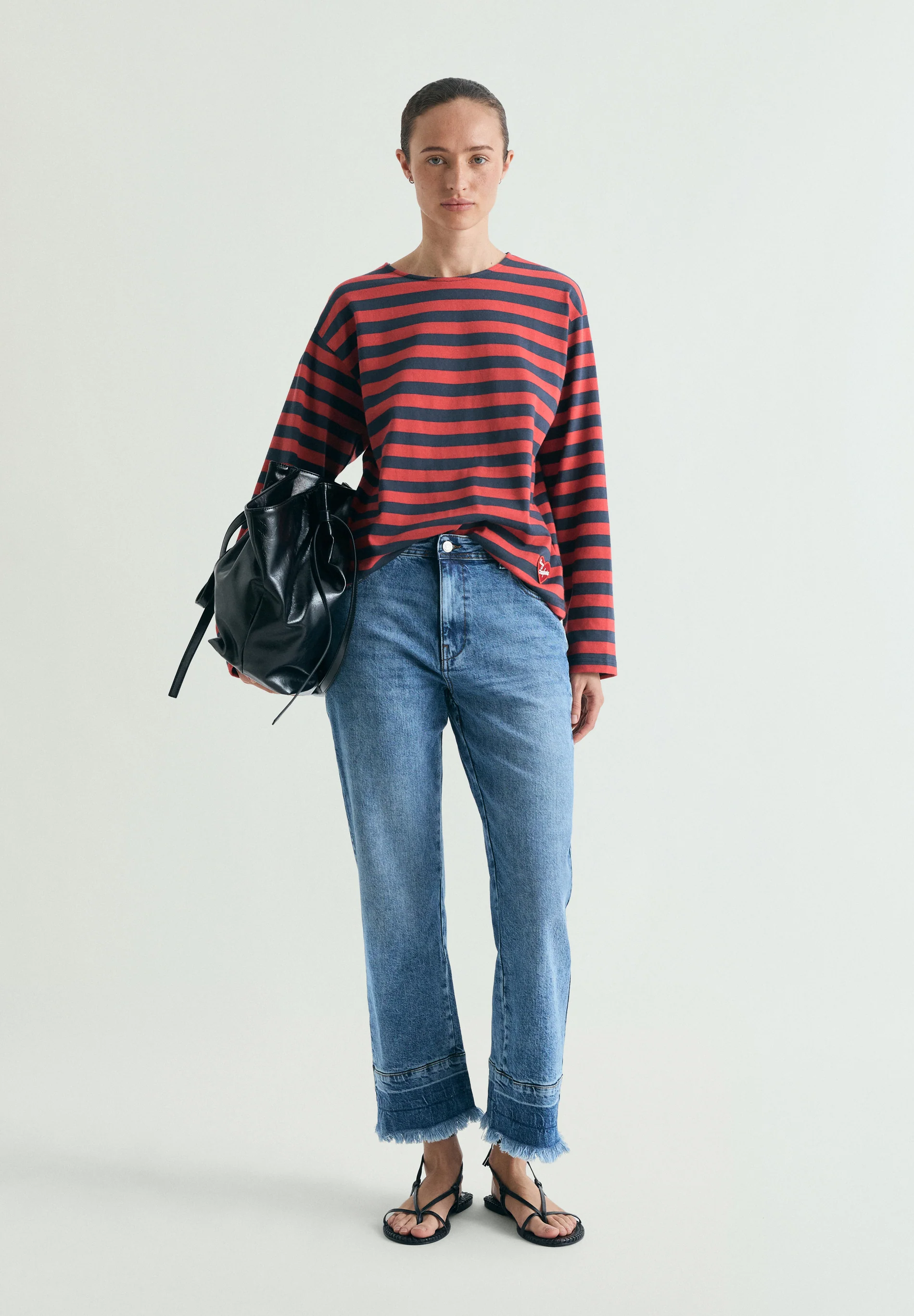 JEANS EFECTO LAVADO DESFLECADOS